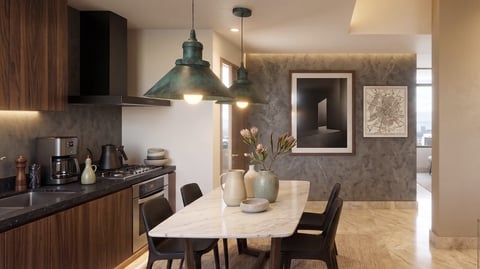 Modern kitchen and dining area with dark wood cabinets, marble table, pendant lights, and contemporary decor