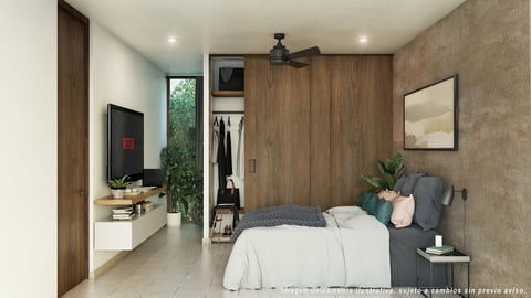 Modern bedroom with bed, built-in wooden wardrobe, desk area, and potted plants in neutral tones