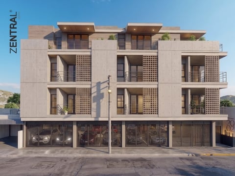 Modern multi-story residential building with beige facade, latticed balconies, and ground-floor commercial space under clear blue sky