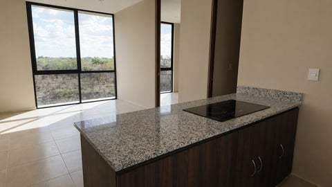 Modern kitchen with granite countertop and dark wood cabinetry, open concept living area with large windows overlooking landscape