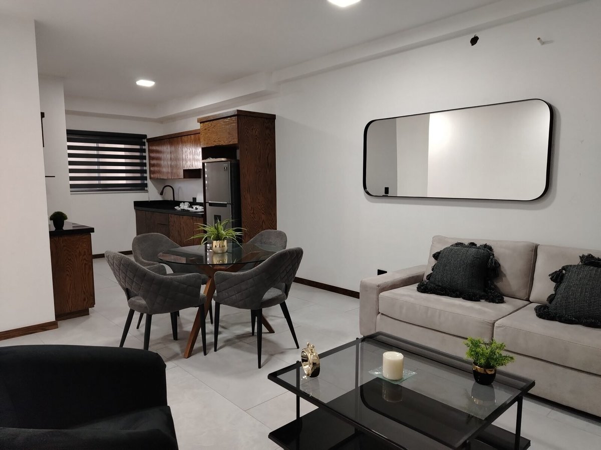 Sala del departamento muestra Urban Loft 511