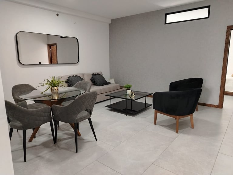 Estancia del departamento muestra Urban Loft 511